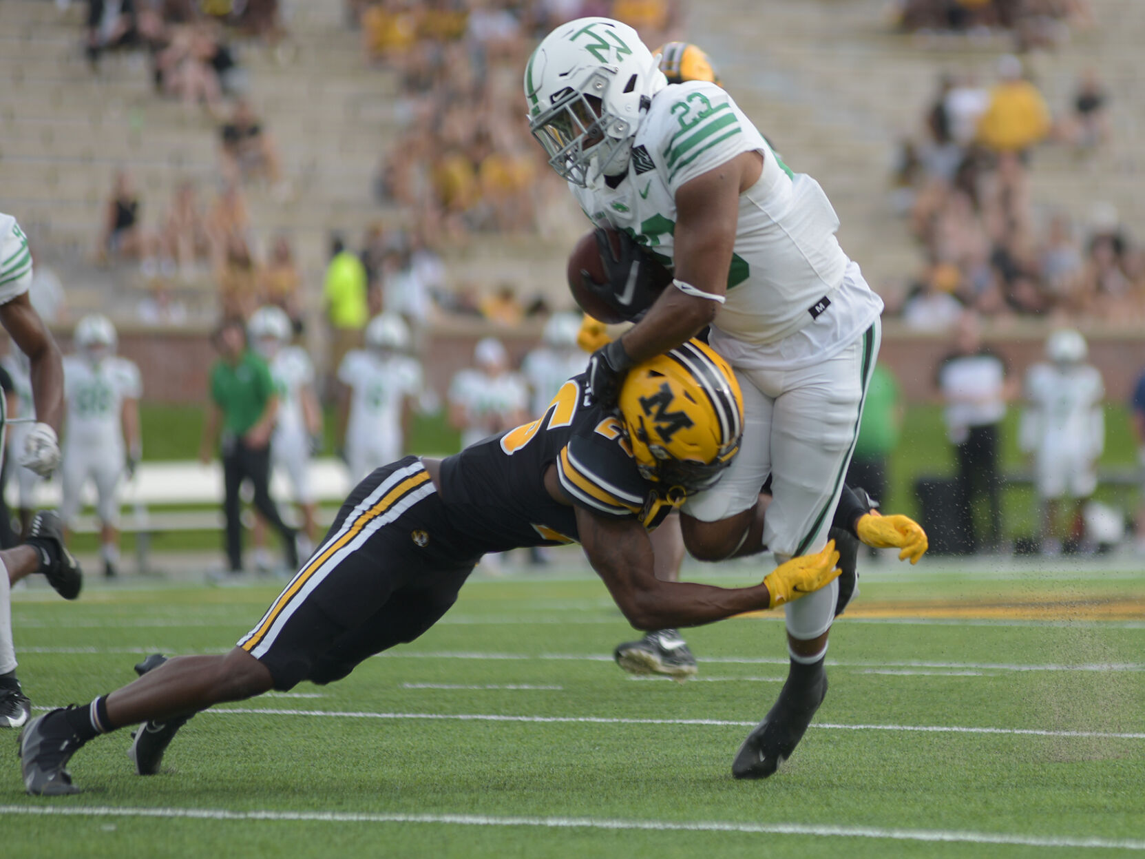 Akayleb Evans tackles Isaiah Johnson